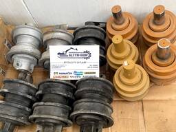 Разные виды катков для экскаваторов